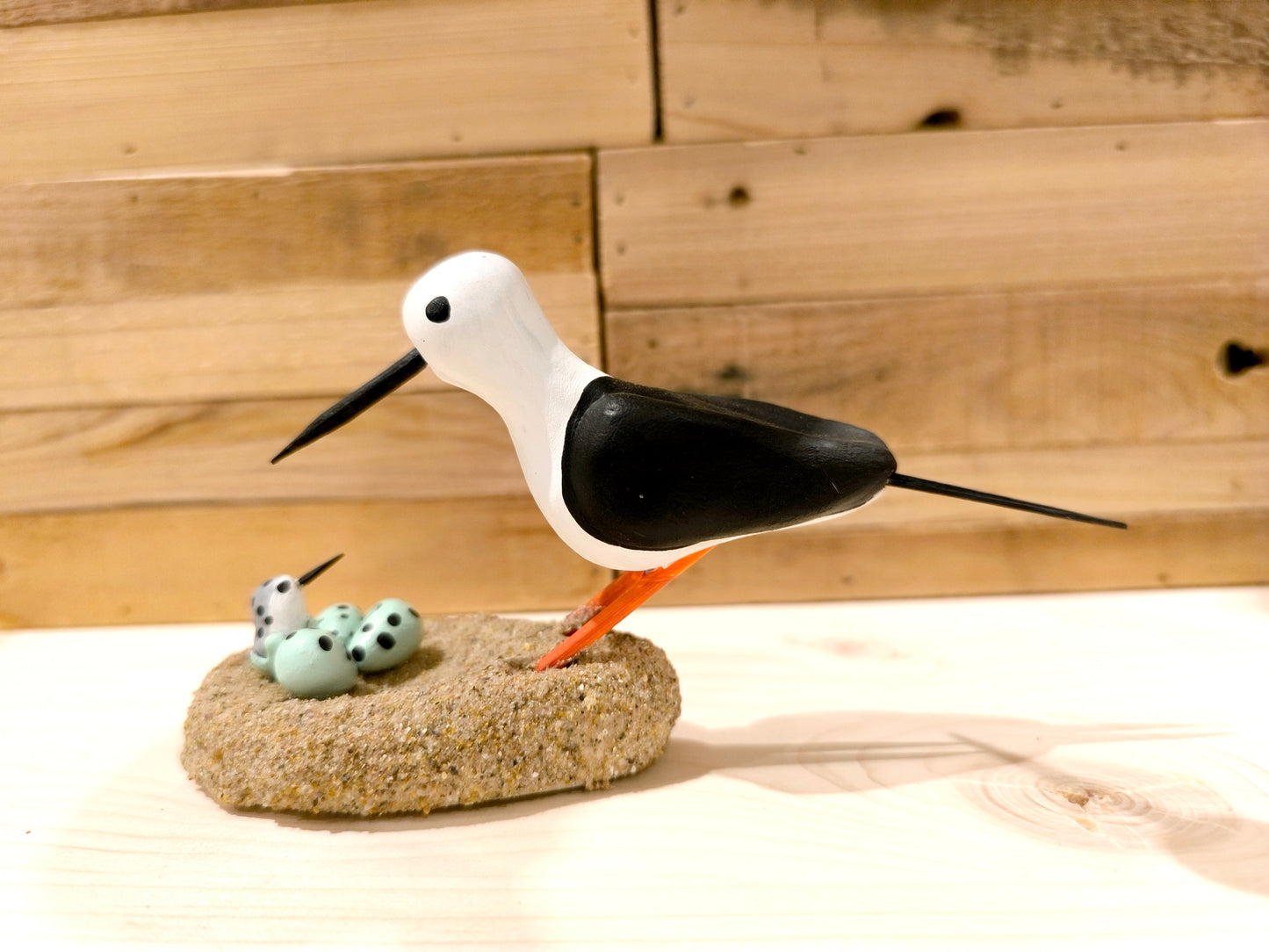 Black-winged stilt on its nest - figurine