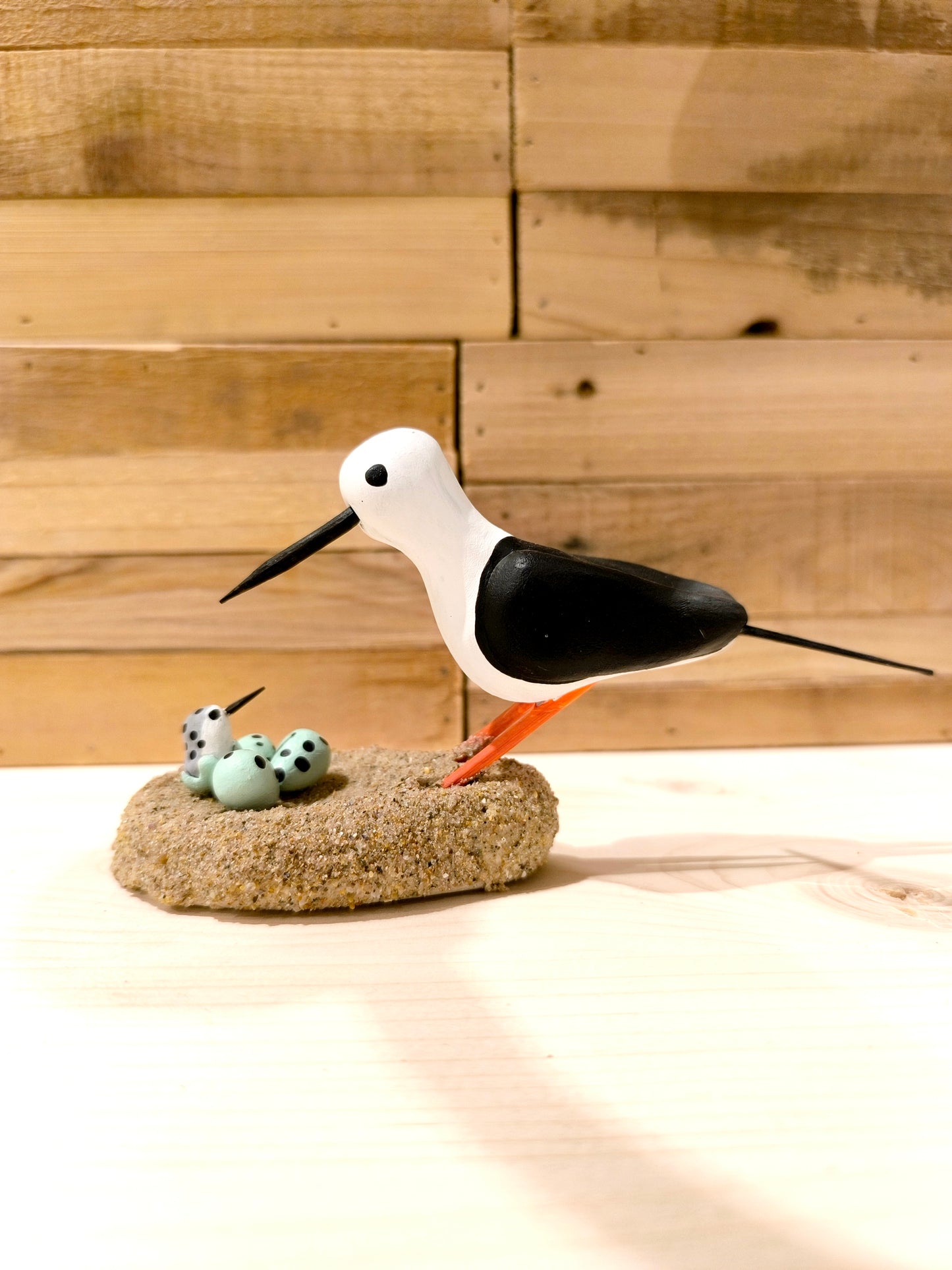 Black-winged stilt on its nest - figurine