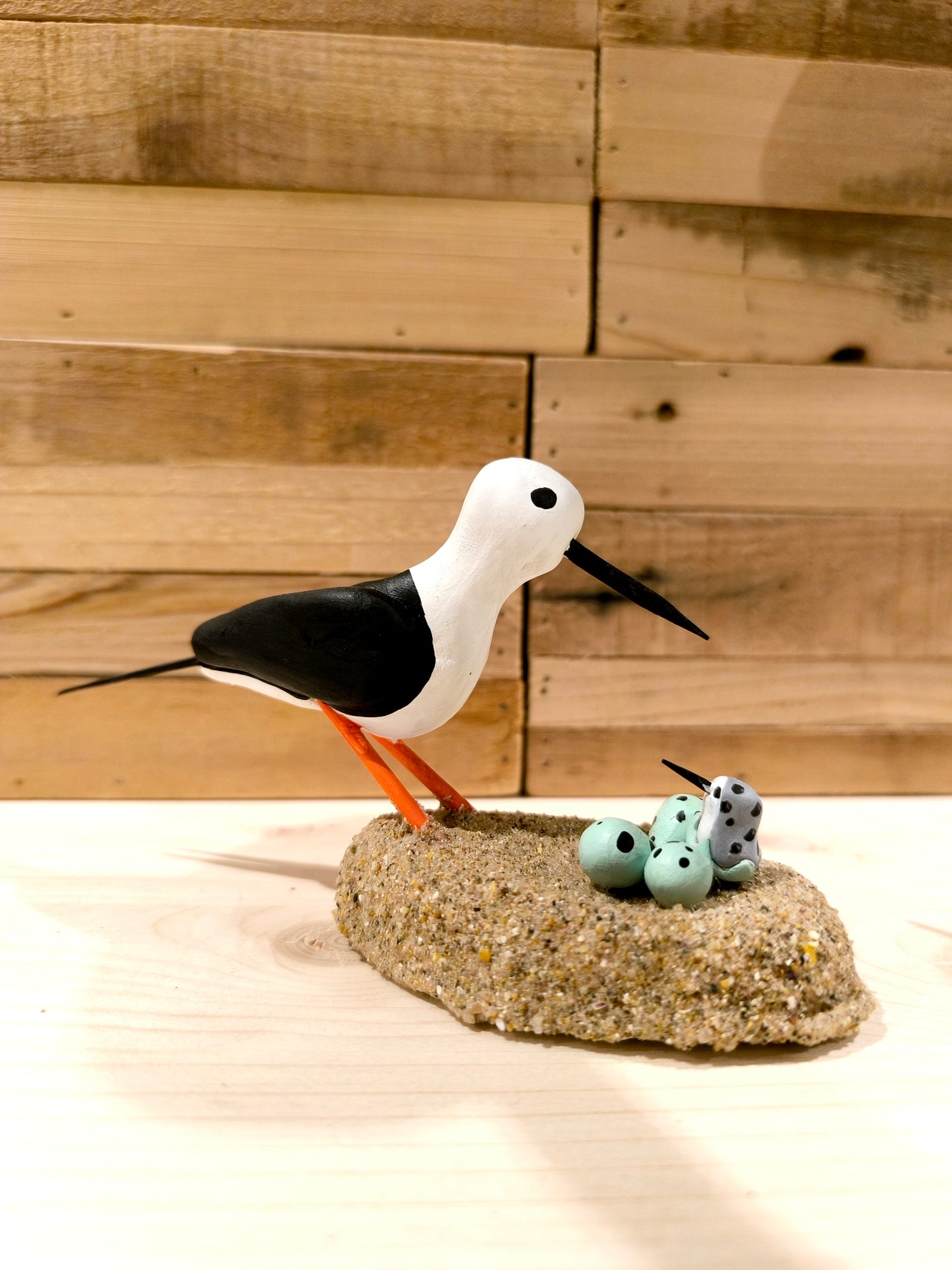 Black-winged stilt on its nest - figurine