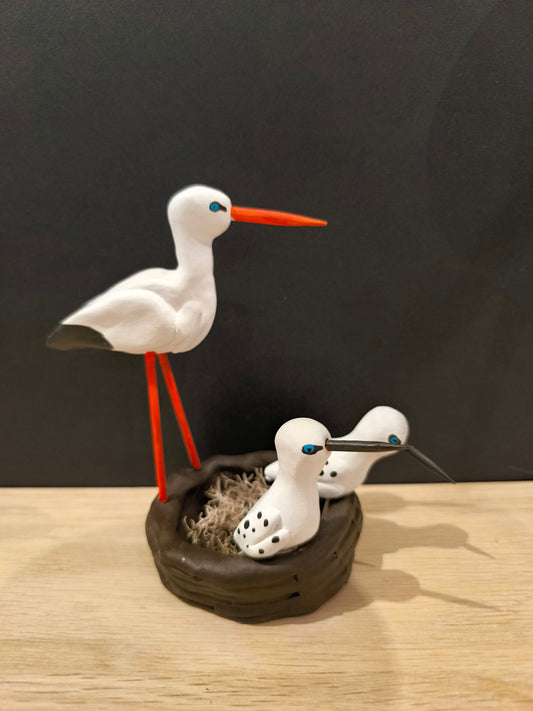 Figurine sculptée nid de Cigogne
