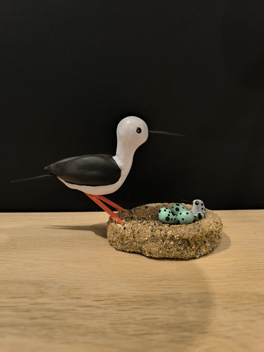 Black-winged stilt on its nest - figurine